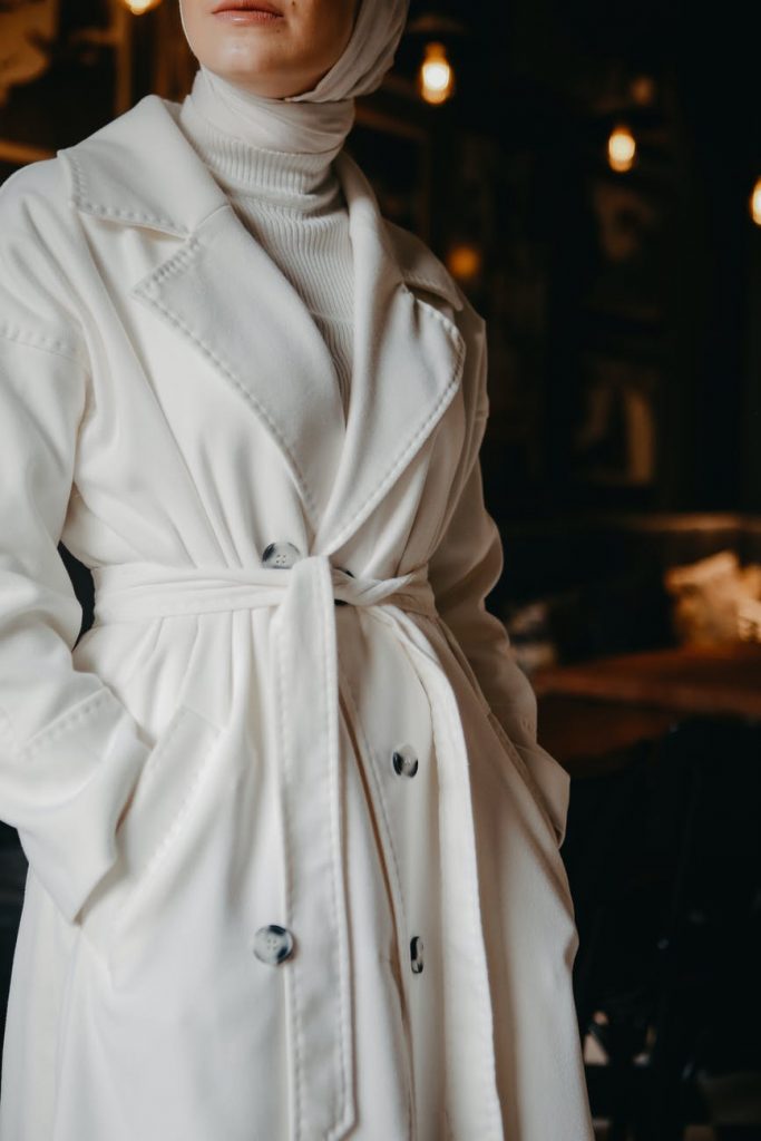 woman in white coat
