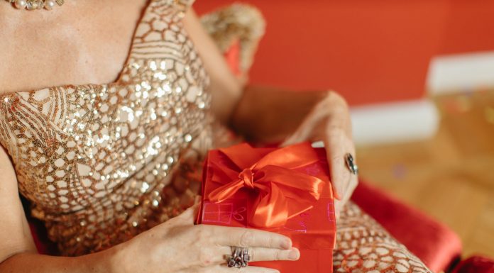 a person holding a present