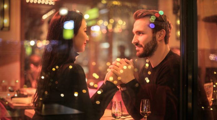 photography of couple holding hands